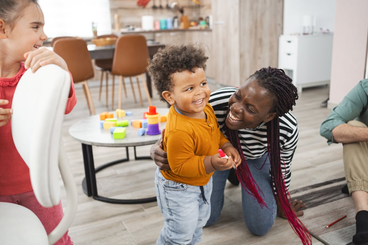 Caregiver playing with child